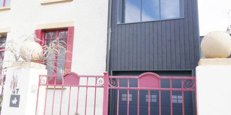 Construction neuve agence immobilière façade